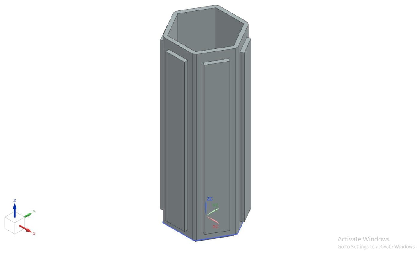The hex outer body, shelled with recessed flats on each face.