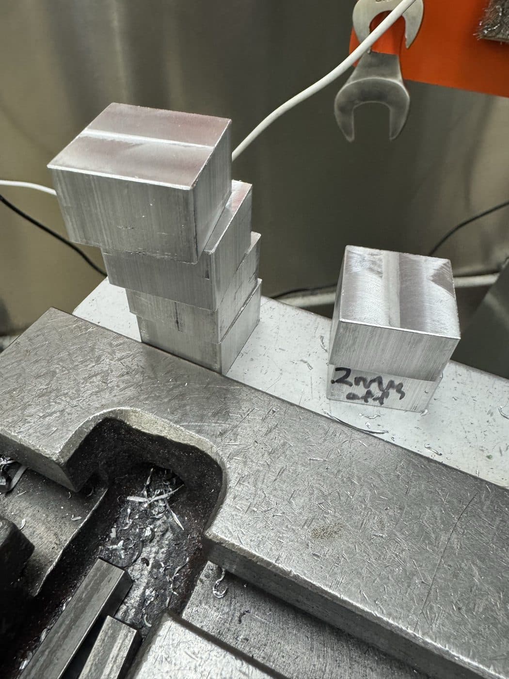 Aluminium hardpoint blanks for the chassis, sawn and faced to size and stacked.