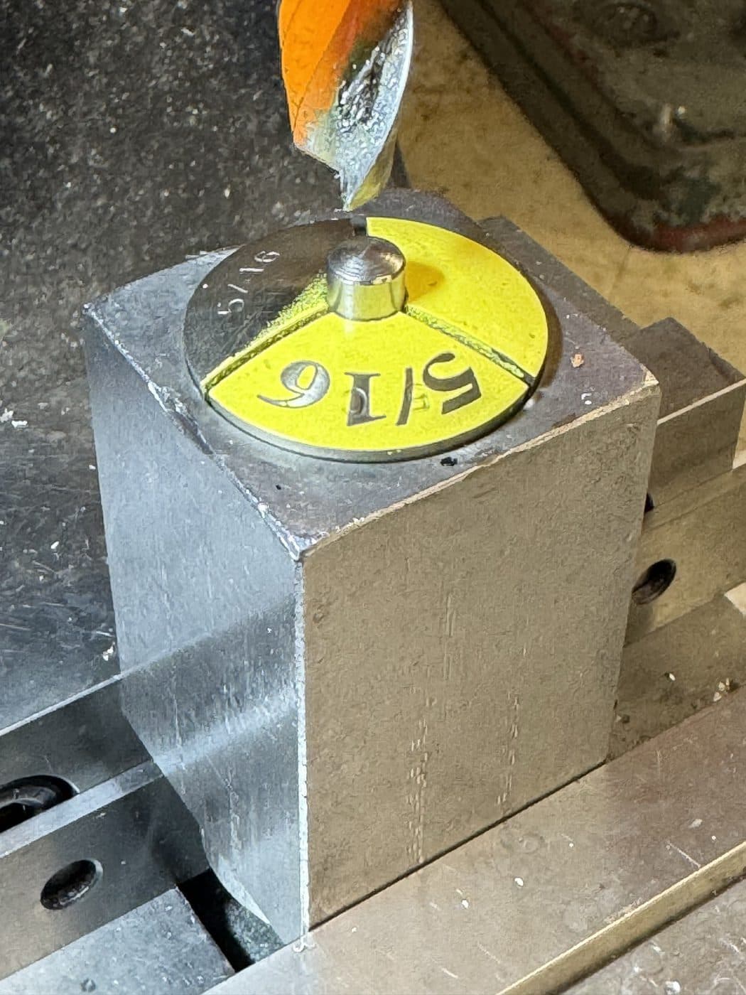 A 5/16 inch setup on a steel block held in the vise, indicated true before the cut.