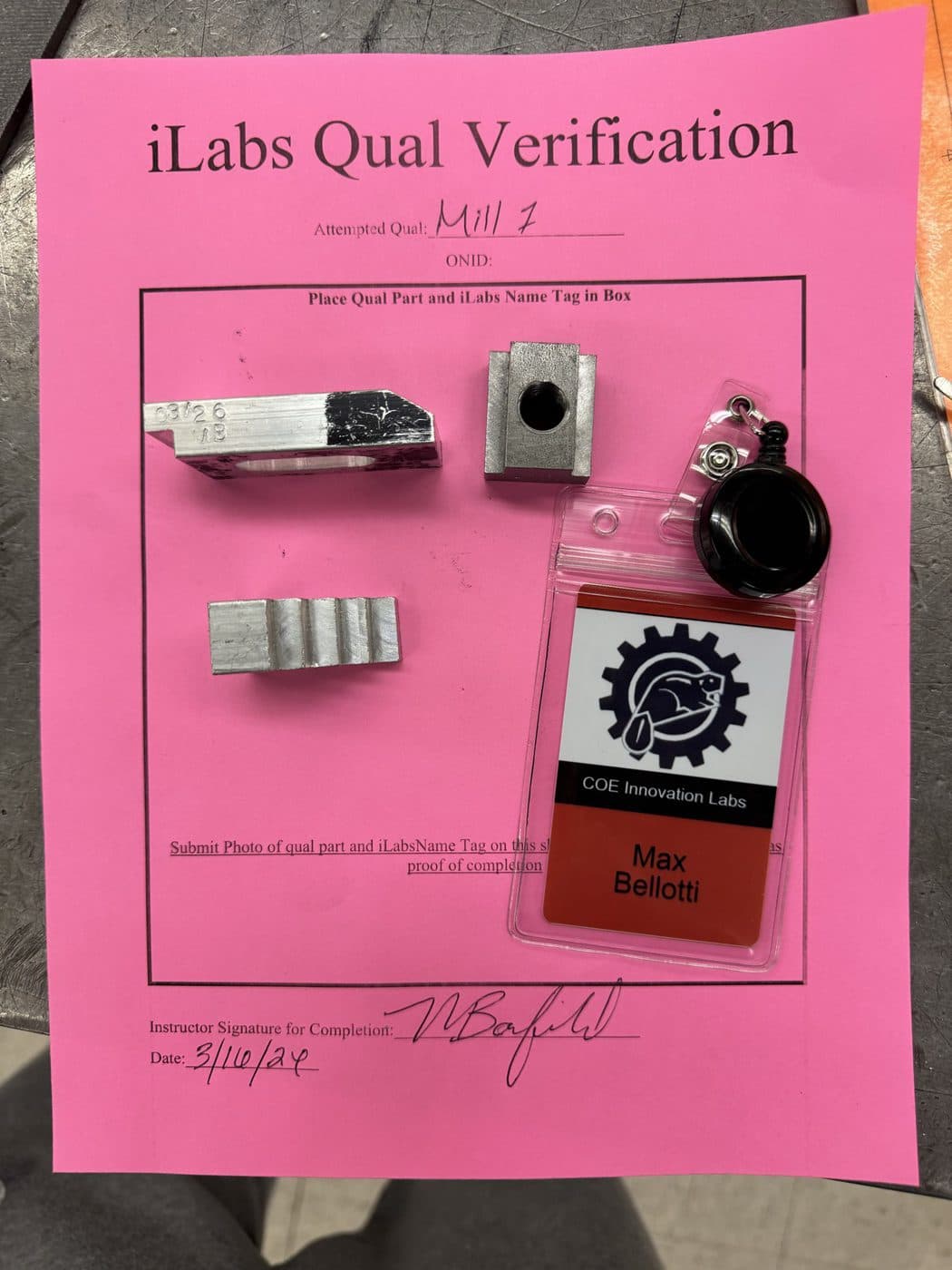 Signed iLabs mill qualification sheet with an angled cut, a stepped block and a slotted block.