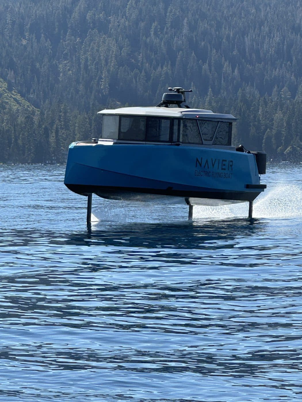 The Navier N30 up on its foils on Lake Tahoe, hull fully clear of the water.